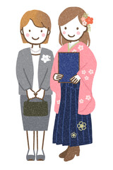 卒業式に出席する親子