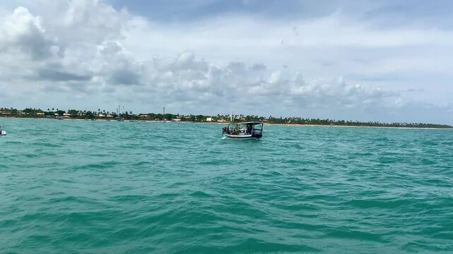 People on boats on the high seas to celebrate Yemanja's day. Festival of the queen of the sea, orisha Yemanj&aacute;.