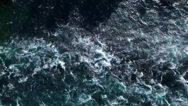 Aerial View of Turbulent Ocean Waves in Motion