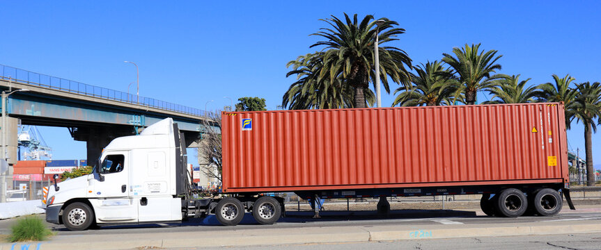 Los Angeles, California &ndash; January 13, 2025: Freight Truck carrying a FLORENS shipping container on a street toward the Port of Los Angeles in San Pedro