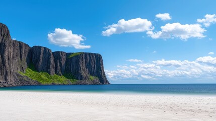 Naklejka premium Serene beach with cliffs under a bright blue sky.