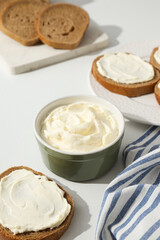 Sandwiches with Philadelphia cheese on a light background.