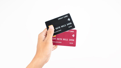 Hand holding red and black credit card on white background