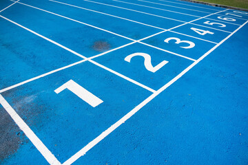 Athletics Running Track with Blue Surface and White Lane Lines Designed for Competitive Use
