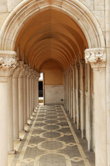 Stunning architectural colonnade in Salou, Spain showcasing arched design and intricate stonework