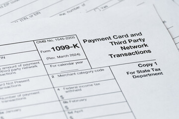 Obraz premium Form 1099-K, Payment Card and Third Party Network Transactions, IRS Tax Document Close-Up