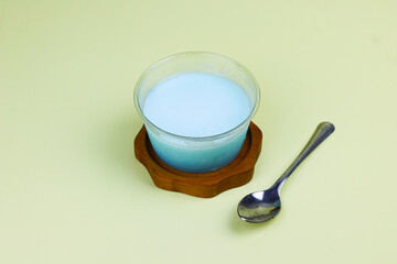 Silky pudding in a cup with isolated background.
