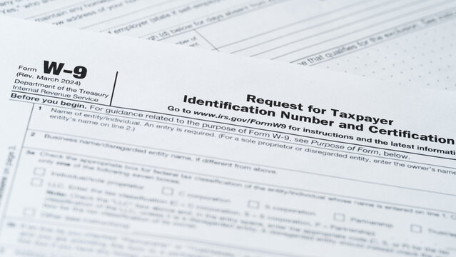 W9 Tax Form, IRS Taxpayer Identification, Federal Document, Paper Close-Up