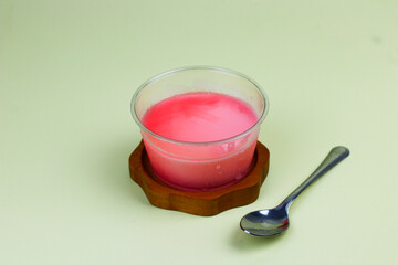 Silky pudding in a cup with isolated background.
