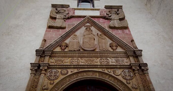 Upward shot of the facade of the Parish of the Nativity of Mary in Tepoztl&aacute;n, Mexico