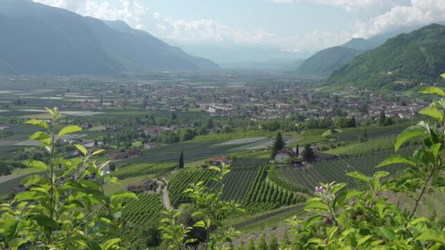 View over Lana in the Etschtal Valley surrounded by mountains towards Bozen - Bolzano, South Tyrol, Italy