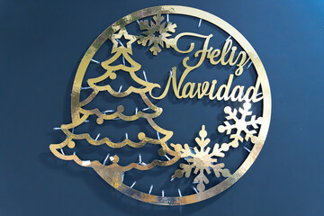 Christmas greeting card with gold and green colors.