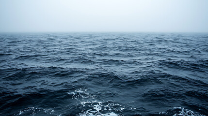 Fototapeta premium The ocean is calm and peaceful, with only a few waves breaking on the shore. generated by AI