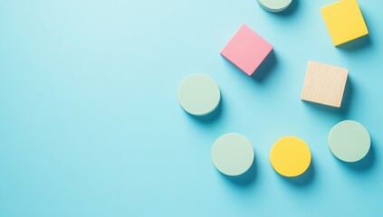 Colorful Geometric Shapes Arranged on Blue Background: A Creative Design