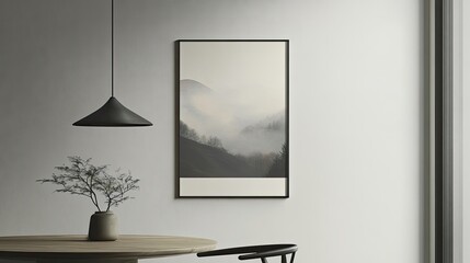 Fototapeta premium Misty mountain landscape print displayed in minimalist interior, showing dining room decor