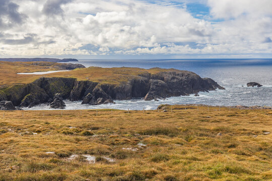 Scotland, Hebrides. Isle of Lewis, Aird Uig. Rugged coastline of Gallan Head. Moorland.
