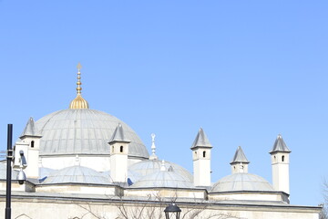 Domes and Chimneys Rise Against the Blue Sky: Exploring Architectural Detail and Historical...