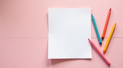 Blank Paper and Colorful Pencils on a Pink Surface Ready for Creative Expression
