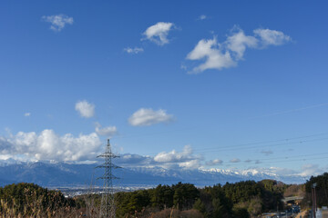 Obraz premium 信州冬の風景 雪が積もった北アルプス