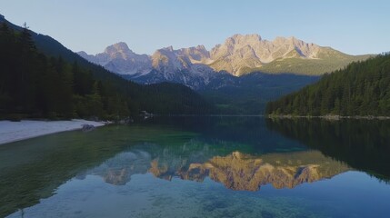 A lake with mountains in the background