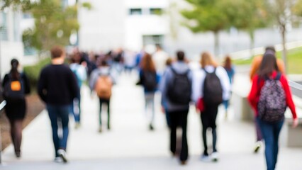 Campus Walkway Blur - A blurred background of a university campus pathway, symbolizing student journeys.
