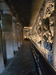 A corridor with Buddha Carvings at Ajanta Caves