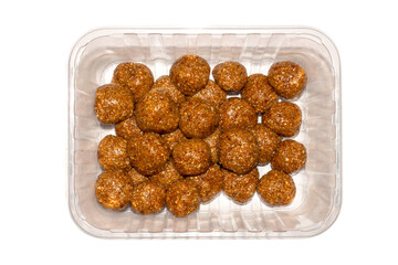 Kozinaki with honey.Nuts and seeds with honey.Kozinaki made of seeds and nuts on a white background.