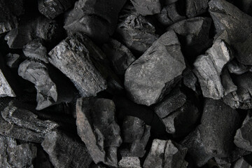 Full view of Charcoal preparation for barbeque. Charcoal texture background