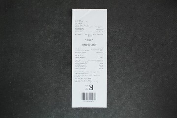 Malaysia, kuala Terengganu 15 January 2025 : receipts or bills of payment with a dark background....