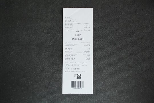 Malaysia, kuala Terengganu 15 January 2025 : receipts or bills of payment with a dark background. proof of purchase concept