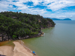 Overlooking hidden sand beach in Bako National Park, Kuching, Sarawak, Malaysia. Surrounded by...