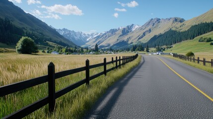 Fototapeta premium Country Road through Mountain Valley