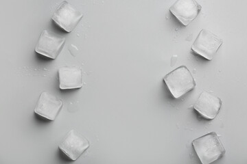 Frozen ice cubes on grey background
