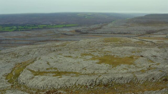 Aerial drone footage of Burren National Park, capturing rocky mountain peaks from above