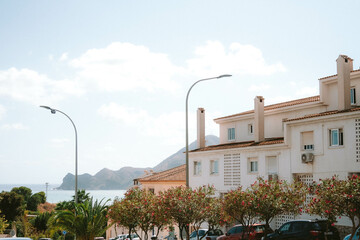 view of a white house with mountain in background