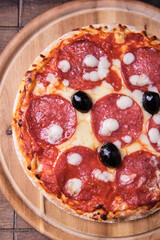 Cup of coffee and Cantuccini (Italian cookies) on dark wooden background. Copy space.