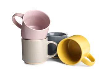 Set of different ceramic mugs isolated on white background