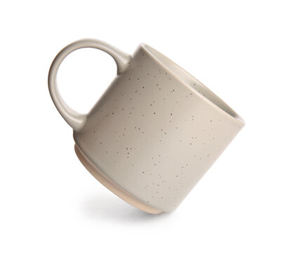 Empty ceramic mug isolated on white background