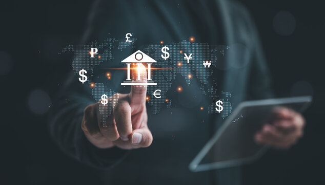 Global currency exchange concept, Businessman touch virtual world map and dollar yuan yen euro and pound sterling sign. Global business, international trading currency, world economy money, transfer