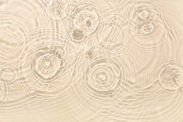 Texture of clean water with splashes on light background