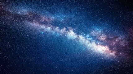 Obraz premium A night sky filled with bright stars and the Milky Way visible, evoking a sense of wonder.