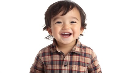 58. A young child with short black hair, wearing a plaid shirt and laughing, on a white background