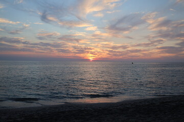Sunset ocean sky Dusky swirling sky. High quality photo