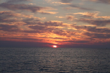 Sunset ocean sky Dusky swirling sky. High quality photo