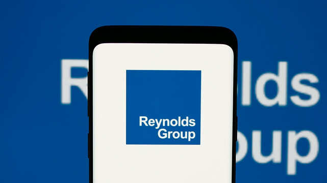 Stuttgart, Germany - 12-30-2024: Mobile phone with logo of New Zealand packaging company Reynolds Group Ltd. on screen. Focus on phone display.
