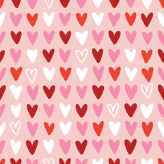 Seamless hand drawn little hearts pattern. Colorful doodle hearts. Template for design, postcards, Valentine's Day, Mother's Day, textiles, wallpapers, banners. Vector design