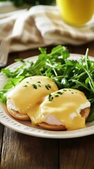 Delicious Eggs Benedict with Hollandaise Sauce and Arugula