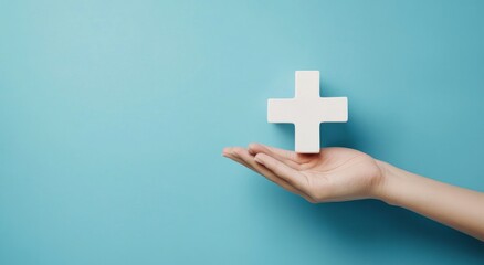 Hand holding a white plus symbol on a blue background.