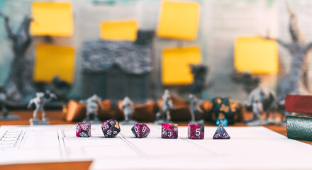 Violet dice place for adventure story TTRPG role playing tabletop game and board game hobby