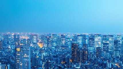 Obraz premium Cyber security and sleek, A stunning urban skyline at dusk, showcasing illuminated skyscrapers against a deep blue sky.